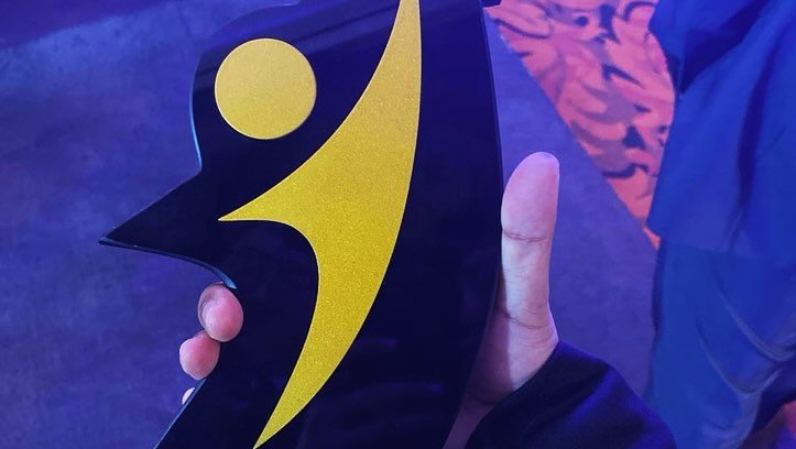 Award trophy held up close